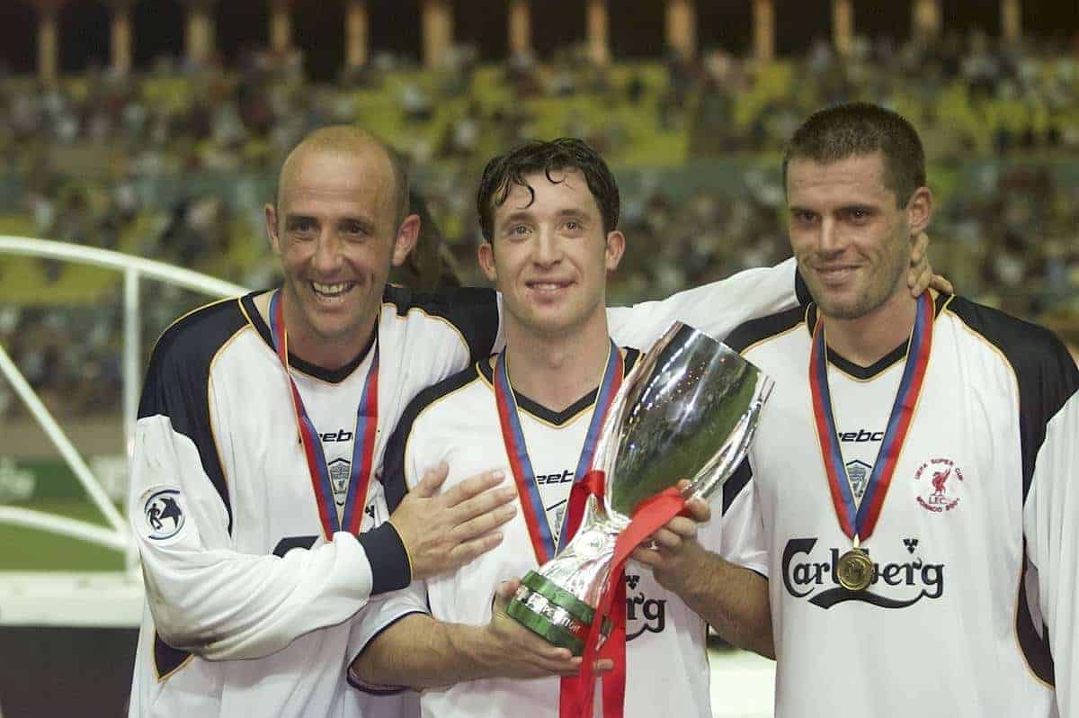 MONACO, FRANCE - Friday, August 24, 2001: Liverpool's Gary McAllister (left), Robbie Fowler (centre) and Jamie Carragher (right) with the UEFA Super Cup trophy after beating Bayern Munich 3-2 at the Stade Louis II in Monaco. (Pic by David Rawcliffe/Propaganda)