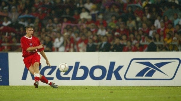 BANGKOK, THAILAND - Thailand. Thursday, July 24, 2003: Liverpool's Gregory Vignal in front of a Reebok ad board during a preseason friendly match at the Rajamangala National Stadium. (Pic by David Rawcliffe/Propaganda)