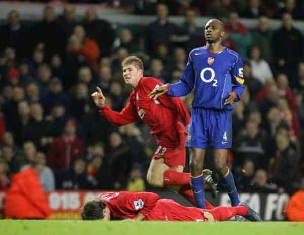 LIVERPOOL, ENGLAND- SUNDAY NOVEMBER 28th 2004: Liverpool's Neil Mellor celebrates scoring the winning goal in injury time as Arsenal's Patrick Vieira looks on dejected during the Premiership match at Anfield. (Pic by David Rawcliffe/Proparganda)