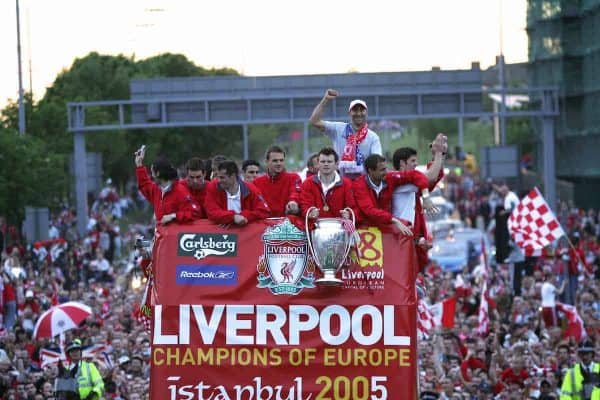 LIVERPOOL, ENGLAND - THURSDAY, MAY 26th, 2005: Liverpool players (L-R) Luis Garcia, Steven Finnan, Jamie Carragher, Dietmar Hamann, John Arne Riise, Jerzy Dudek, Xabio Alonso with coach Pako Ayesteran (top) parade the European Champions Cup on on open-top bus tour of Liverpool in front of 500,000 fans after beating AC Milan in the UEFA Champions League Final at the Ataturk Olympic Stadium, Istanbul. (Pic by David Rawcliffe/Propaganda)