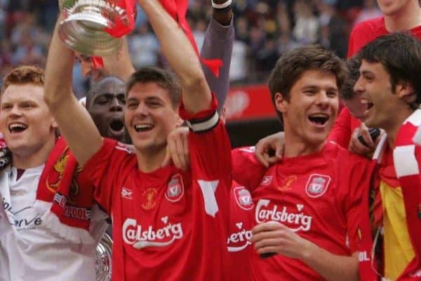 CARDIFF, WALES - SATURDAY, MAY 13th, 2006: Liverpool's captain Steven Gerrard lifts the FA Cup surrounded by team-mates L-R Momo Sissoko, John Arne Riise, Xabi Alonso and Fernando Morientes after beating West Ham United on penalties during the FA Cup Final at the Millennium Stadium. (Pic by David Davies/Pool/Propaganda)