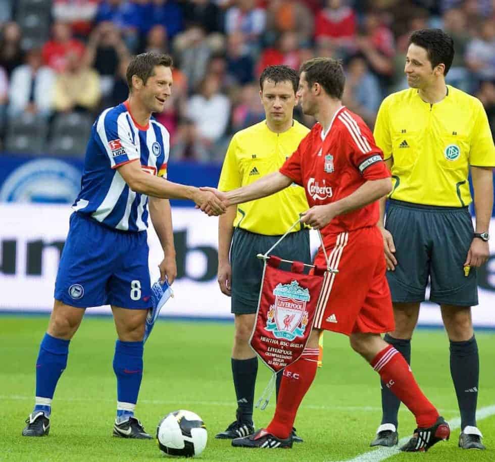 BERLIN, GERMANY - Tuesday, July 22, 2008: Liverpool's captain Jamie Carragher shakes hands with Hertha BSC Berlin's captain Pal Dardal during a pre-season friendly match at the Olympiastadion. (Photo by David Rawcliffe/Propaganda)