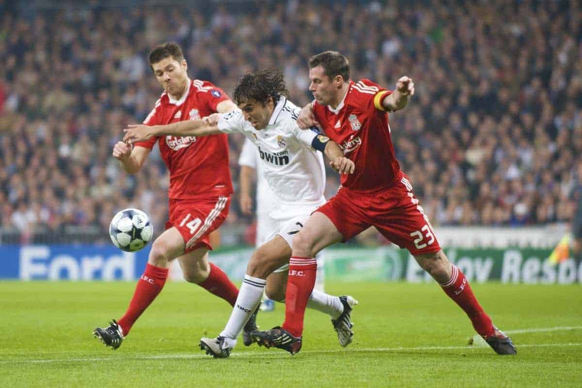 MADRID, SPAIN - Wednesday, February 25, 2009: Liverpool's Jamie Carragher and Xabi Alonso tackle Real Madrid's Raul Gonzalez during the UEFA Champions League First Knock-Out Round at the Santiago Bernabeu. (Photo by David Rawcliffe/Propaganda)