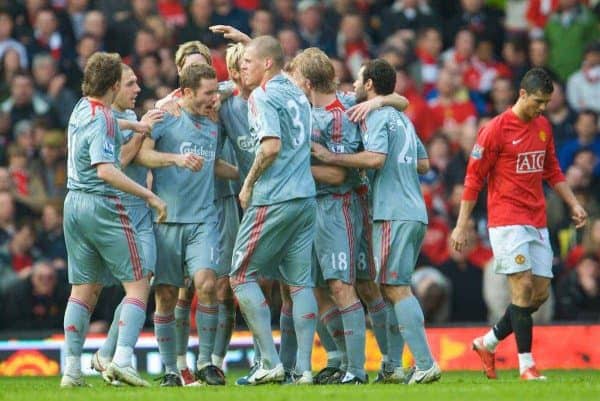 MANCHESTER, ENGLAND - Saturday, March 14, 2009: Liverpool's Fabio Aurelio is mobbed by team-mates after scoring his side's third goal against Manchester United during the Premiership match at Old Trafford. (Photo by David Rawcliffe/Propaganda)