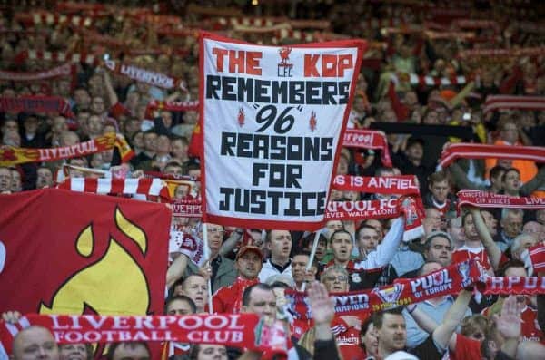 LIVERPOOL, ENGLAND - Saturday, April 11, 2009: Liverpool's supporters on the Spion Kop display a banner calling for justice, before the 20th anniversary of the Hillsborough Stadium Disaster, which claimed the lives of 96 supporters. (Photo by: David Rawcliffe/Propaganda)