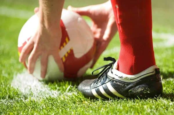 LIVERPOOL, ENGLAND - Saturday, April 11, 2009: The adidas boots of Liverpool's Xabi Alonso as he prepares to take a corner-kick during the Premiership match against Blackburn Rovers at Anfield. (Photo by: David Rawcliffe/Propaganda)
