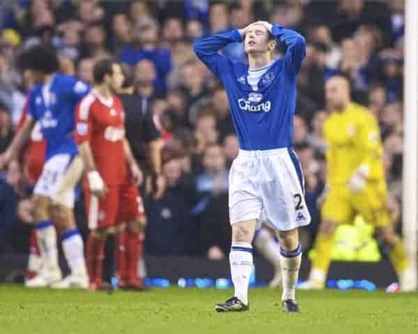 LIVERPOOL, ENGLAND - Sunday, November 29, 2009: Everton's Tony Hibbert looks dejected, as team-mate Marouane Fellaini is denied from point blank range by Liverpool's goalkeeper Pepe Reina during the Premiership match at Goodison Park. The 212th Merseyside Derby. (Photo by David Rawcliffe/Propaganda)