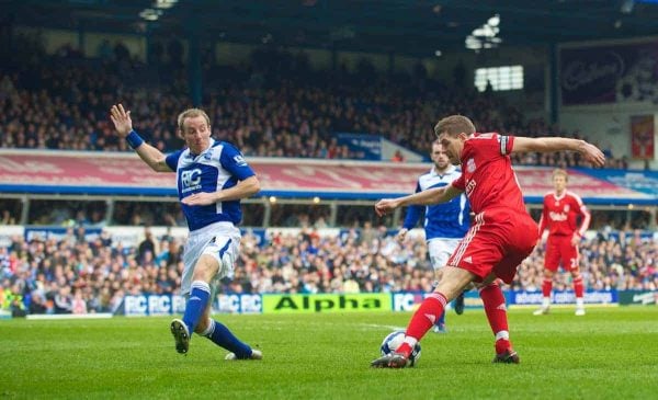 BIRMINGHAM, ENGLAND - Sunday, April 4, 2010: Liverpool's captain Steven Gerrard MBE turns inside Birmingham City's Lee Bowyer before scoring the opening goal during the Premiership match at St Andrews. (Photo by David Rawcliffe/Propaganda)