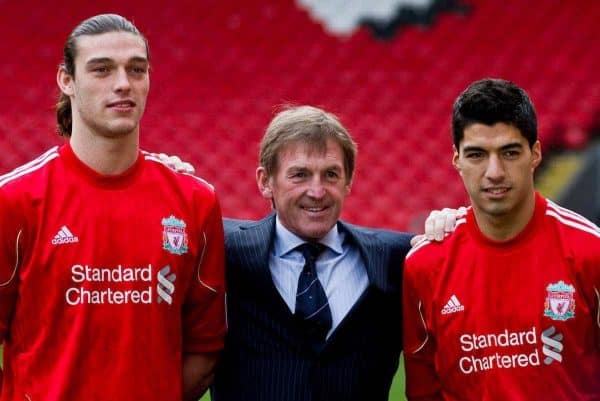 LIVERPOOL, ENGLAND - Thursday, February 3, 2011: Liverpool's new sigingings Luis Suarez and Andy Carroll with manager Kenny Dalglish during a photo-call at Anfield. Suarez signed from Ajax for 22.8m whilst Carroll arrived from Newcastle United for a club record fee of 35m (Photo by Vegard Grott/Propaganda).