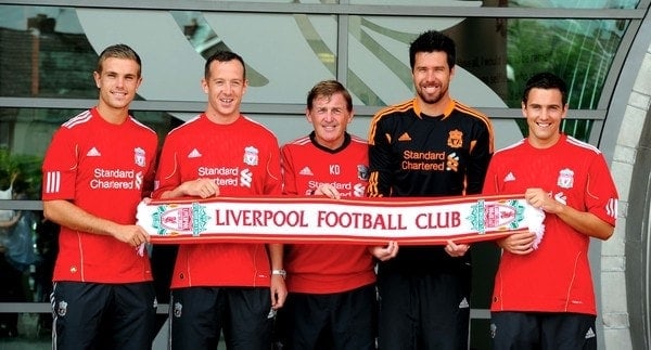 Picture by Jason Roberts...... New Liverpool signings (left to right) Jordan Henderson, Charlie Adam, manager Kenny Dalglish, Alexander Doni and Stewart Downing pose for photographers following a press conference at Melwood Training Ground, Liverpool.