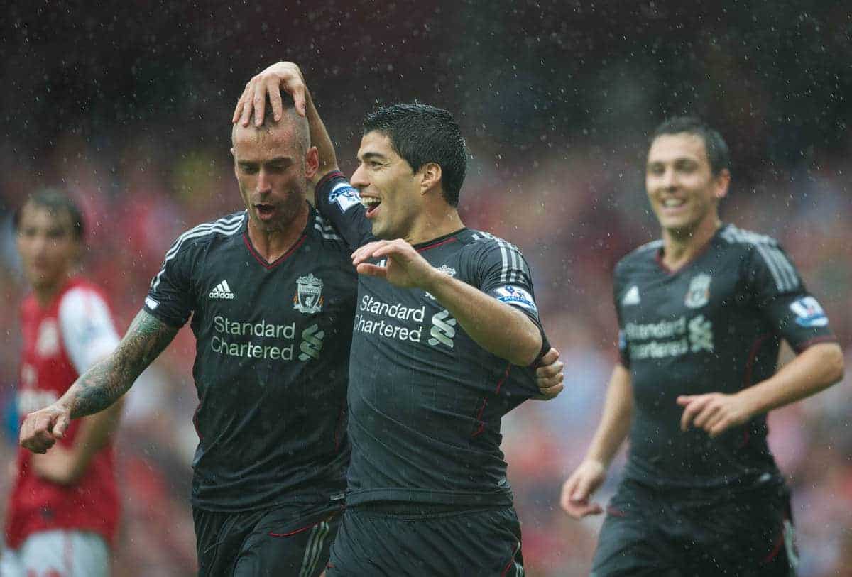 LONDON, ENGLAND - Saturday, August 20, 2011: Liverpool's Luis Alberto Suarez Diaz and Raul Meireles celebrates scoring the first goal against Arsenal during the Premiership match at the Emirates Stadium. (Pic by David Rawcliffe/Propaganda)