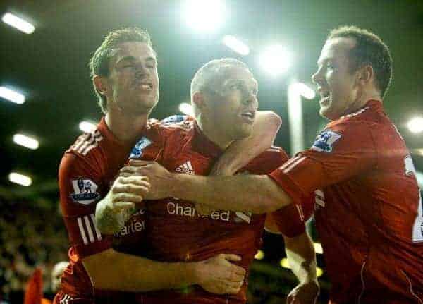 LIVERPOOL, ENGLAND - Wednesday, January 25, 2012: Liverpool's Craig Bellamy celebrates scoring the second goal against Manchester City with team-mates Jordan Henderson and Charlie Adam during the Football League Cup Semi-Final 2nd Leg at Anfield. (Pic by David Rawcliffe/Propaganda)