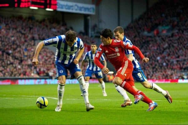 LIVERPOOL, ENGLAND - Saturday, February 19, 2012: Liverpool's Luis Alberto Suarez Diaz in action against Brighton & Hove Albion's Ashley Barnes and Gordon Greer during the FA Cup 5th Round match at Anfield. (Pic by David Rawcliffe/Propaganda)