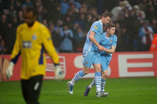 MANCHESTER, ENGLAND - Wednesday, February 22, 2012: Manchester City's Edin Dzeko celebrates scoring the second goal against FC Porto with James Milner during the UEFA Europa League Round of 32 2nd Leg match at City of Manchester Stadium. (Pic by David Rawcliffe/Propaganda)