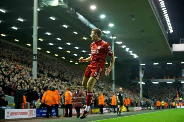 LIVERPOOL, ENGLAND - Tuesday, March 13, 2012: Liverpool's captain Steven Gerrard celebrates scoring the second of his hat-trick of goals against Everton on his 400th Premier Leagie appearance during the Premiership match at Anfield. Liverpool won 3-0 and Gerrard became the first player since Ian Rush in 1982 to score a hat-trick in a Merseyside Derby. (Pic by David Rawcliffe/Propaganda)