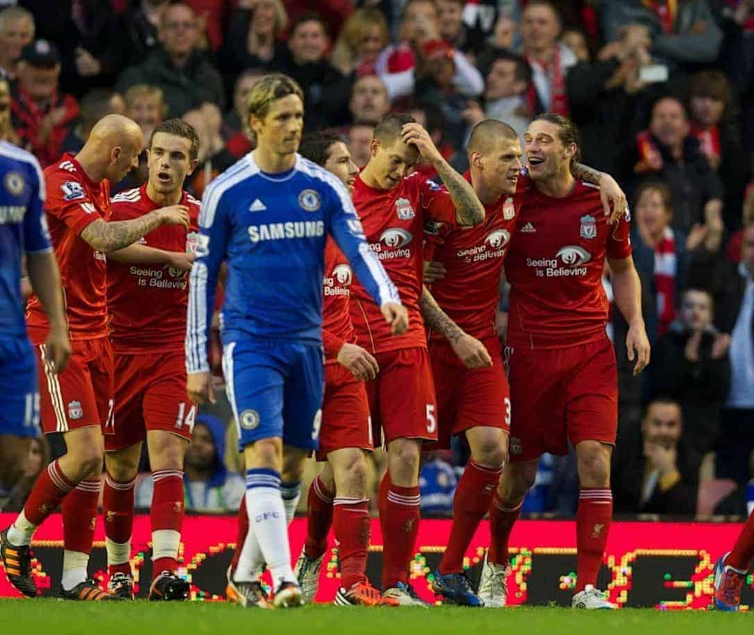 LIVERPOOL, ENGLAND - Tuesday, May 8, 2012: Liverpool's Daniel Agger celebrates scoring the third goal as Chelsea's Fernando Torres looks dejected during the final home Premiership match of the season at Anfield. (Pic by David Rawcliffe/Propaganda)