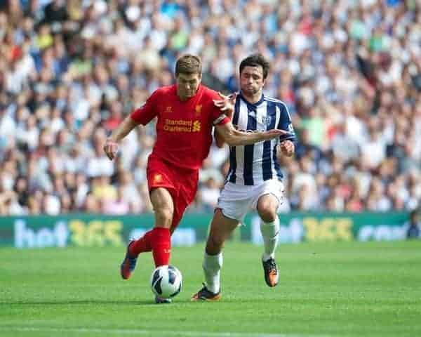 WEST BROMWICH, ENGLAND - Saturday, August 18, 2012: Liverpool's captain Steven Gerrard in action against West Bromwich Albion's Claudio Yacob during the opening Premiership match of the season at the Hawthorns. (Pic by David Rawcliffe/Propaganda)