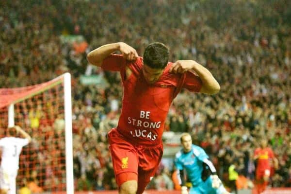 LIVERPOOL, ENGLAND - Thursday, August 30, 2012: Liverpool's Luis Alberto Suarez Diaz celebrates scoring the winning second goal against Heart of Midlothian with a message 'Be Strong Lucas' to injured team-mate Lucas Leiva during the UEFA Europa League Play-Off Round 2nd Leg match at Anfield. (Pic by Jed Wee/Propaganda)