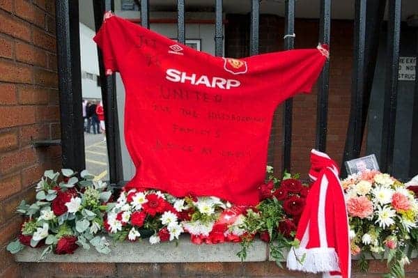 LIVERPOOL, ENGLAND - Sunday, September 23, 2012: A Manchester United shirt with a tribute for the 96 victims of the Hillsborough Stadium Disaster left on the gates of Anfield before the Premiership match between Liverpool and Manchester United. The release of the Hillsborough Independent Panel's report shed light on one of the biggest cover-up's in British history which sought to deflect blame from the Police onto the Liverpool supporters. (Pic by David Rawcliffe/Propaganda)