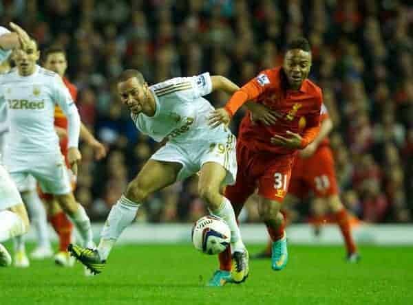 LIVERPOOL, ENGLAND - Wednesday, October 31, 2012: Liverpool's Raheem Sterling in action against Swansea City's Ashley 'Jazz' Richards during the Football League Cup 4th Round match at Anfield. (Pic by David Rawcliffe/Propaganda)