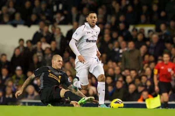 LONDON, ENGLAND - Wednesday, November 28, 2012: Liverpool's Martin Skrtel tackles Tottenham Hotspur's Clint Dempsey during the Premiership match at White Hart Lane. (Pic by David Rawcliffe/Propaganda)