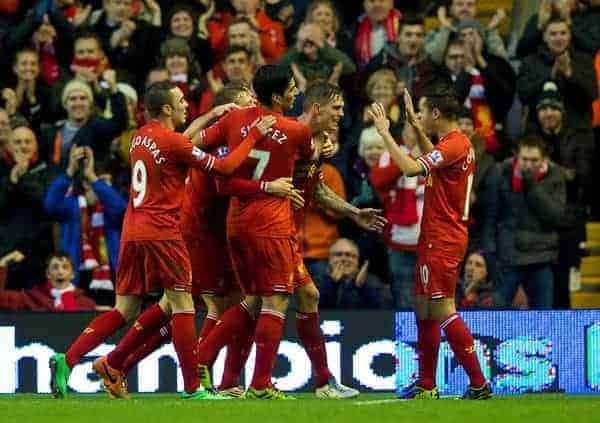 LIVERPOOL, ENGLAND - Wednesday, January 1, 2014: Liverpool's Daniel Agger celebrates scoring the first goal against Hull City during the Premiership match at Anfield. (Pic by David Rawcliffe/Propaganda)