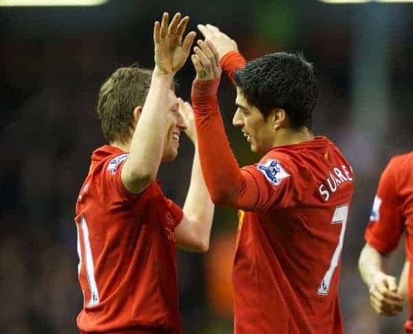 LIVERPOOL, ENGLAND - Wednesday, January 2, 2013: Liverpool's Luis Alberto Suarez Diaz celebrates scoring the third goal against Sunderland with team-mate Lucas Leiva during the Premiership match at Anfield. (Pic by David Rawcliffe/Propaganda)