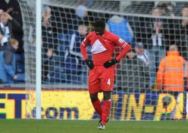 WEST BROMWICH, ENGLAND - Sunday, February 2, 2014: Liverpool's Kolo Toure looks dejected after his error cost his side two points, gifting West Bromwich Albion an equalising goal, during the Premiership match at the Hawthorns. (Pic by Chris Brunskill/Propaganda)