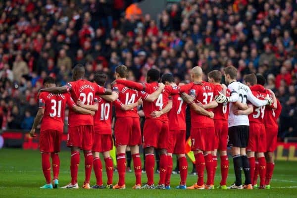 LIVERPOOL, ENGLAND - Saturday, February 8, 2014: Liverpool players stand to remember former player Tony Hateley before the Premiership match against Arsenal at Anfield. (Pic by David Rawcliffe/Propaganda)