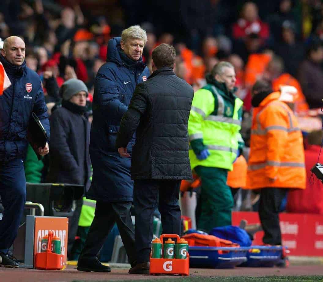 LIVERPOOL, ENGLAND - Saturday, February 8, 2014: Arsenal's manager Arsene Wenger shakes hands with Liverpool's manager Brendan Rodgers after his side are thrashed 5-1 during the Premiership match at Anfield. (Pic by David Rawcliffe/Propaganda)