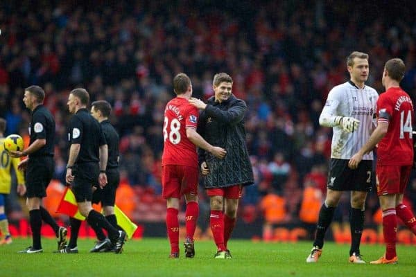 LIVERPOOL, ENGLAND - Saturday, February 8, 2014: Liverpool's captain Steven Gerrard and Jon Flanagan after the 5-1 victory over Arsenal during the Premiership match at Anfield. (Pic by David Rawcliffe/Propaganda)