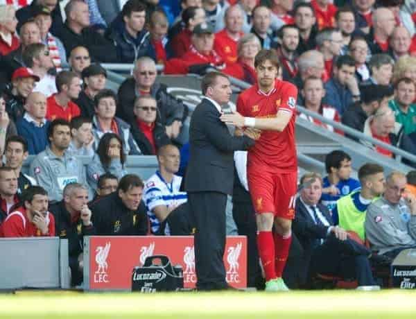 LIVERPOOL, ENGLAND - Sunday, May 19, 2013: Liverpool's substitute Sebastian Coates with manager Brendan Rodgers during the final Premiership match of the 2012/13 season against Queens Park Rangers at Anfield. (Pic by David Rawcliffe/Propaganda)