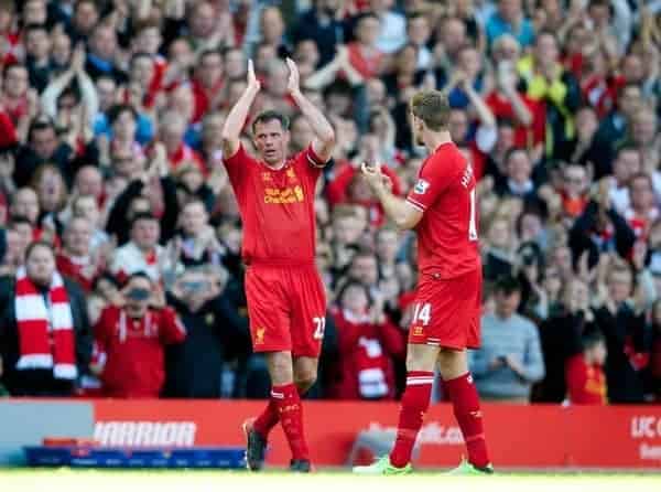 LIVERPOOL, ENGLAND - Sunday, May 19, 2013: Liverpool's Jamie Carragher applauds the supporters as he is substituted in his 737th and last game for the club during the final Premiership match of the 2012/13 season against Queens Park Rangers at Anfield. (Pic by David Rawcliffe/Propaganda)