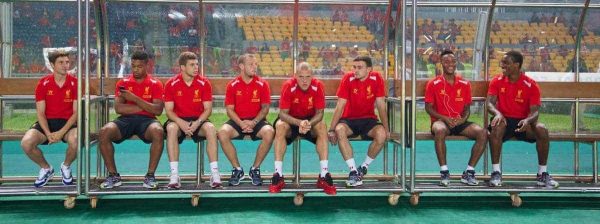 JAKARTA, INDONESIA - Saturday, July 20, 2013: Liverpool players on the bench as they soak up the atmosphere before a preseason friendly against Indonesia XI at the Gelora Bung Karno Stadium. Joe Allen, Jordon Ibe, Jon Flanagan, Jay Spearing, Martin Skrtel, Jack Robinson, Raheem Sterling and Andre Wisdom. (Pic by David Rawcliffe/Propaganda)