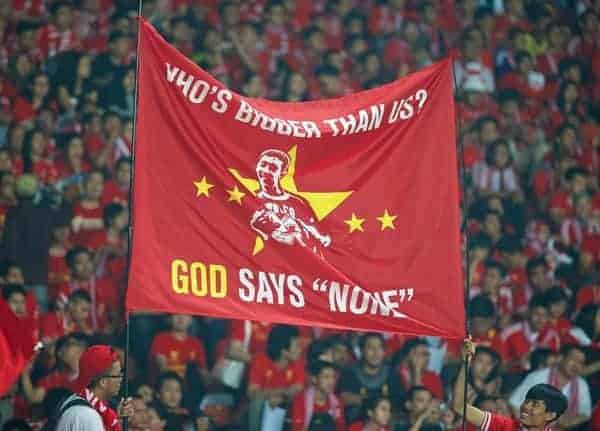 JAKARTA, INDONESIA - Saturday, July 20, 2013: Liverpool supporters' banner 'Who's bigger than us? God says none' during a preseason friendly against Indonesia XI at the Gelora Bung Karno Stadium. (Pic by David Rawcliffe/Propaganda)