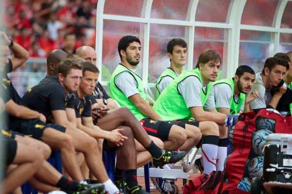 BANGKOK, THAILAND - Sunday, July 28, 2013: Liverpool's substitute Luis Suarez sits on the bench during a preseason friendly match against Thailand XI at the Rajamangala National Stadium. (Pic by David Rawcliffe/Propaganda)