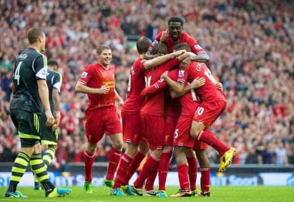 LIVERPOOL, ENGLAND - Saturday, August 17, 2013: Liverpool's Daniel Sturridge celebrates with team-mates after scoring the first goal against Stoke City during the Premiership match at Anfield. (Pic by David Rawcliffe/Propaganda)