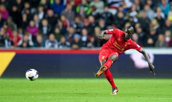SWANSEA, WALES - Monday, September 16, 2013: Liverpool's Mamadou Sakho in action against Swansea City during the Premiership match at the Liberty Stadium. (Pic by David Rawcliffe/Propaganda)
