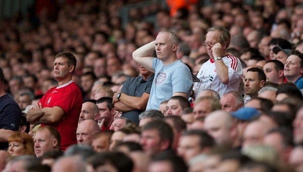 LIVERPOOL, ENGLAND - Saturday, September 21, 2013: Liverpool supporters on the Spion Kop look dejected as they watch their side lose 1-0 to Southampton during the Premiership match at Anfield. (Pic by David Rawcliffe/Propaganda)