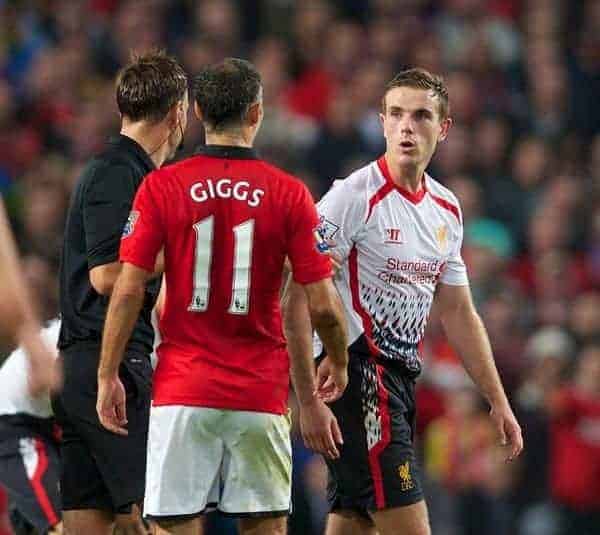 MANCHESTER, ENGLAND - Wednesday, September 25, 2013: Liverpool's Jordan Henderson and Manchester United's Ryan Giggs square put to each other during the Football League Cup 3rd Round match at Old Trafford. (Pic by David Rawcliffe/Propaganda)