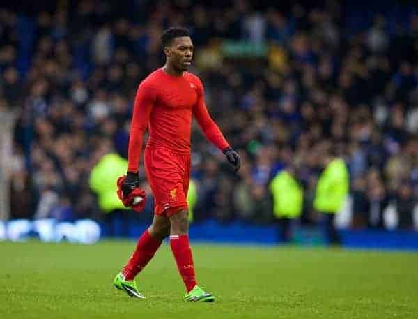LIVERPOOL, ENGLAND - Saturday, November 23, 2013: Liverpool's Daniel Sturridge takes his shirt off to give to a supporter after his side's 3-3 draw with Everton during the 221st Merseyside Derby Premiership match at Goodison Park. (Pic by David Rawcliffe/Propaganda)