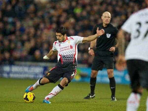 HULL, ENGLAND - Sunday, December 1, 2013: Liverpool's Luis Suarez takes a free-kick against Hull City during the Premiership match at the KC Stadium. (Pic by David Rawcliffe/Propaganda)