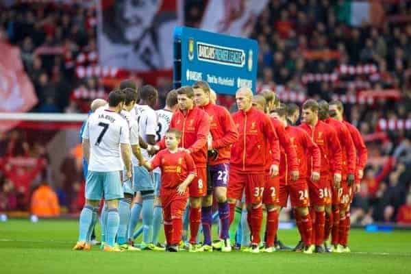 LIVERPOOL, ENGLAND - Saturday, December 7, 2013: Liverpool's Steven Gerrard, captaining the club for the 300th time, shakes hands with West Ham United players before the Premiership match at Anfield. (Pic by David Rawcliffe/Propaganda)