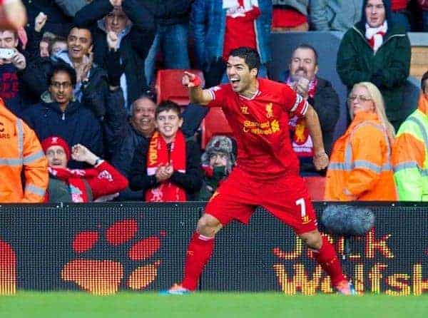 LIVERPOOL, ENGLAND - Saturday, December 21, 2013: Liverpool's Luis Suarez celebrates scoring the first goal against Cardiff City during the Premiership match at Anfield. (Pic by David Rawcliffe/Propaganda)