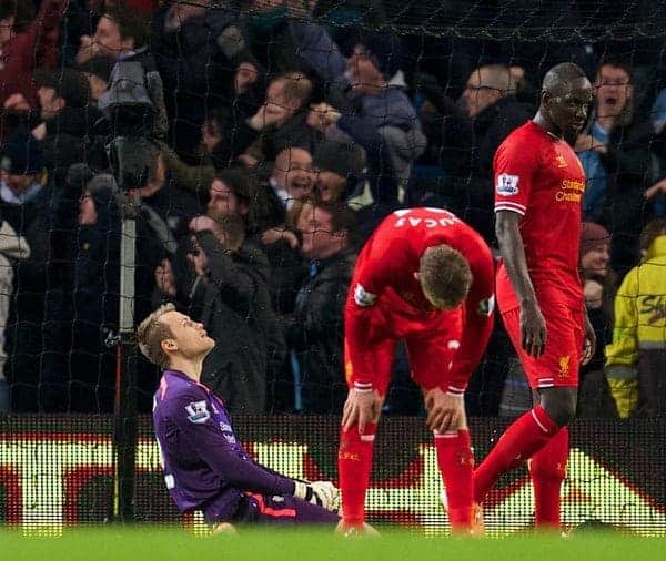 MANCHESTER, ENGLAND - Boxing Day Thursday, December 26, 2013: Liverpool's goalkeeper Simon Mignolet looks dejected as Manchester City score the second goal to make the score 2-1 during the Premiership match at the City of Manchester Stadium. (Pic by David Rawcliffe/Propaganda)