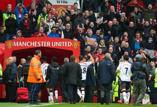 MANCHESTER, ENGLAND - Sunday, March 16, 2014: Liverpool's Jon Flanagan celebrates as the Manchester United supporters watch the victorious players walk off the pitch during the Premiership match at Old Trafford. (Pic by David Rawcliffe/Propaganda)