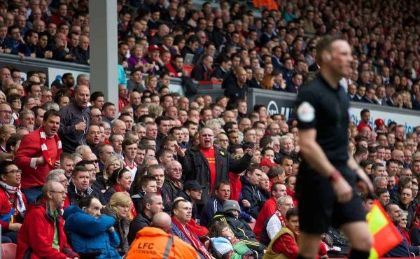 LIVERPOOL, ENGLAND - Sunday, March 30, 2014: A Liverpool supporter berates the linesman during the Premiership match against Tottenham Hotspur at Anfield. (Pic by David Rawcliffe/Propaganda)