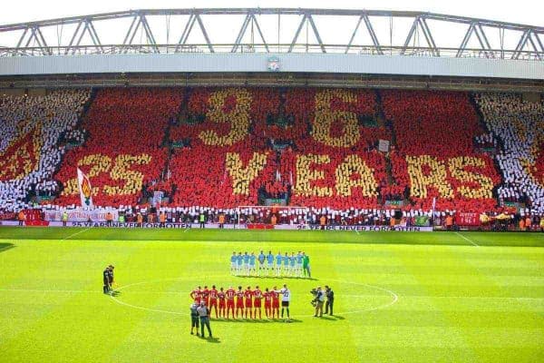 LIVERPOOL, ENGLAND - Sunday, April 13, 2014: Liverpool fans on the Spion Kop create a mosaic remembering the 96 victims of the Hillsborough Stadium Disaster before the Premiership match against Manchester City at Anfield. (Pic by David Rawcliffe/Propaganda)