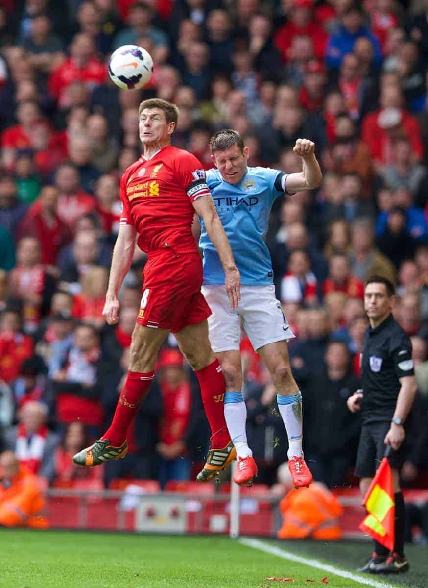 LIVERPOOL, ENGLAND - Sunday, April 13, 2014: Liverpool's captain Steven Gerrard in action against Manchester City's James Milner during the Premiership match at Anfield. (Pic by David Rawcliffe/Propaganda)