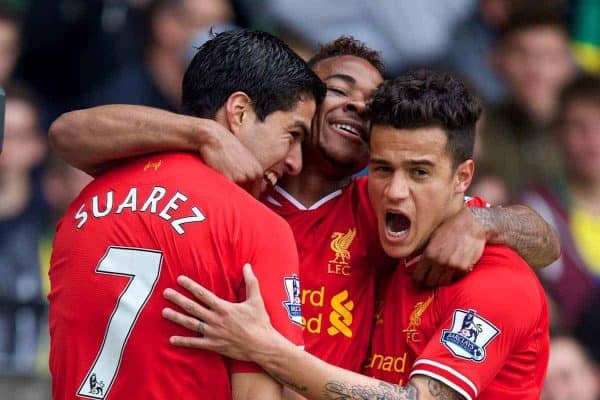 NORWICH, ENGLAND - Sunday, April 20, 2014: Liverpool's Luis Suarez celebrates scoring the second goal against Norwich City with team-mates Raheem Sterling and Philippe Coutinho Correia during the Premiership match at Carrow Road. (Pic by David Rawcliffe/Propaganda)